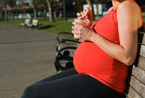 pregnant_woman_on_bench.jpg