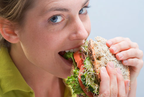 woman_eating_sandwich.jpg